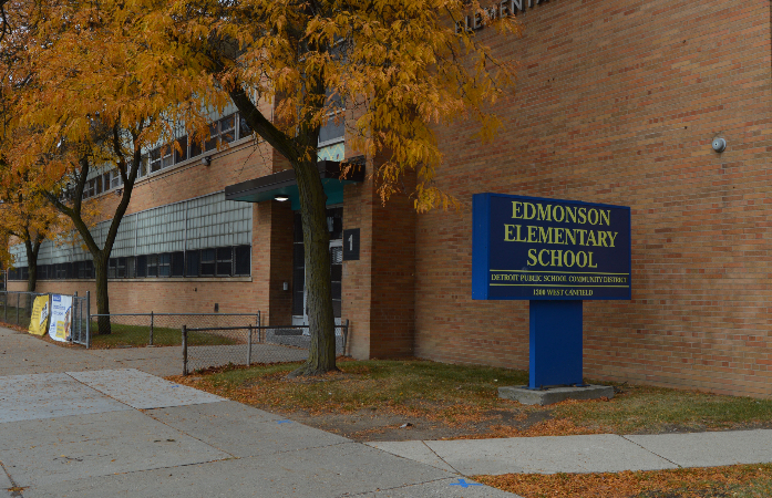  Picture of the school and sign out front